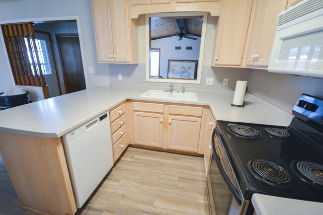 Building Photo - Abundant space & storage throughout this updated 4br home!