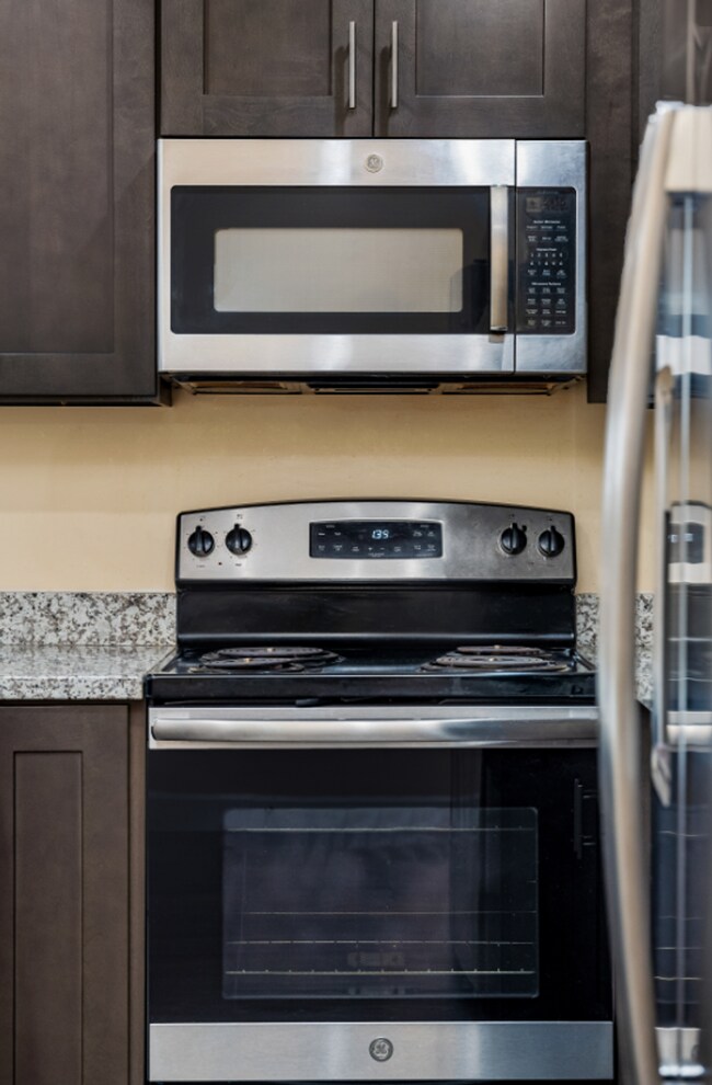 Building Photo - Sophisticated One-Bedroom Living at Marigold Apartments — Available Now