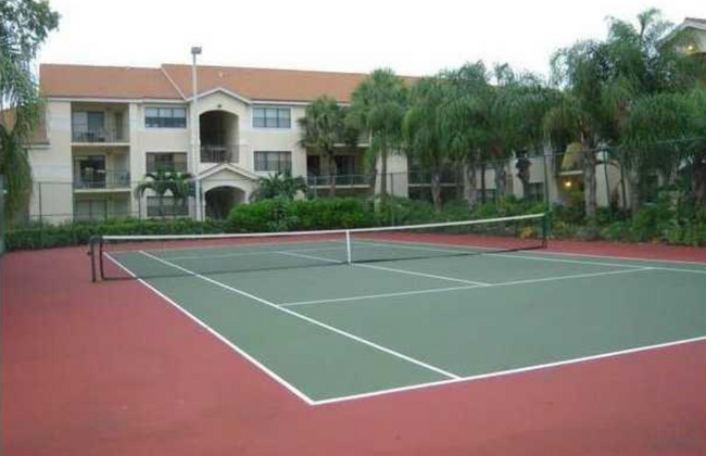 Beautiful tennis court is close by for exercise and fun. - 550 S Park Rd