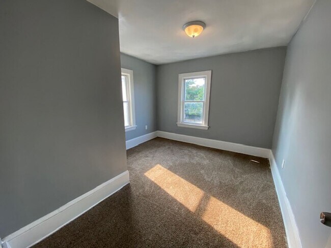 Building Photo - Roomy Goodyear Heights 5-Bed with Finished Attic, Fenced Yard & Garage — Fresh, Bright, Ready for...