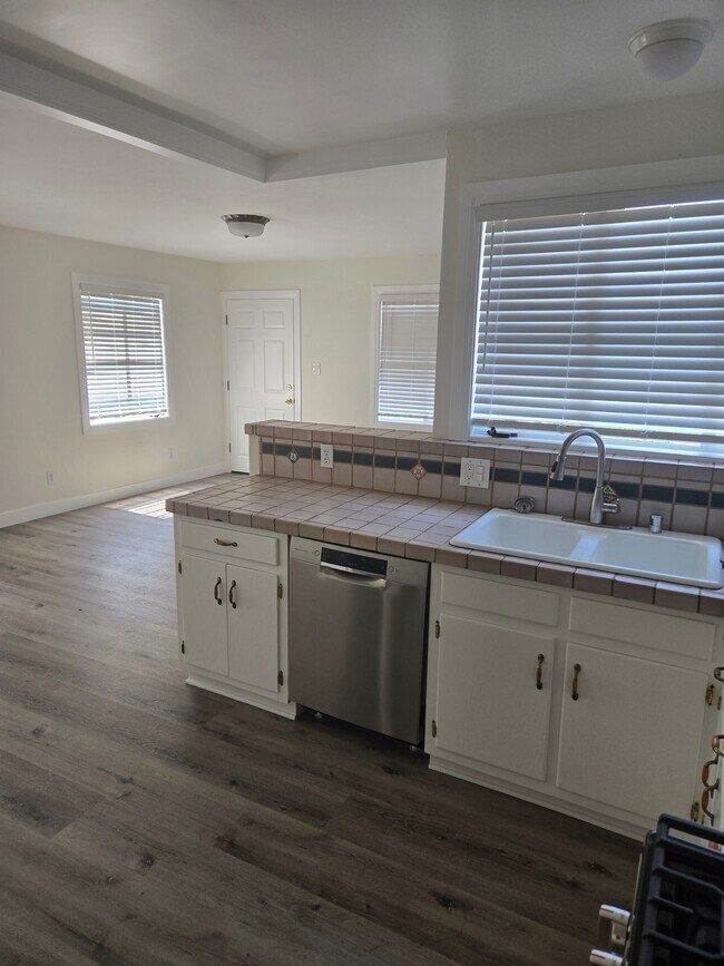 Kitchen looking into Living area - 2632 St George St