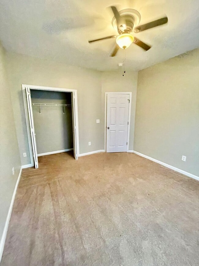 Building Photo - This two-story, 4-bedroom, 2-bath duplex in Fort Mill, SC sits on a corner lot