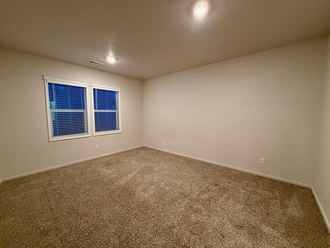 Building Photo - New Construction 4 Bed Mead School District Rancher w/ Fully-Fenced Yard and Attached Garage!