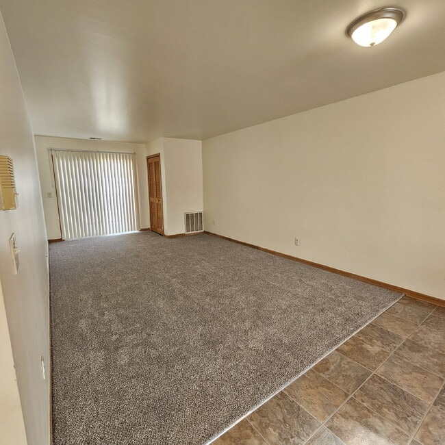 Building Photo - 2 Bedroom Upper Condo w/ Open Kitchen to Living Room Space. All Appliances Included along with Wa...