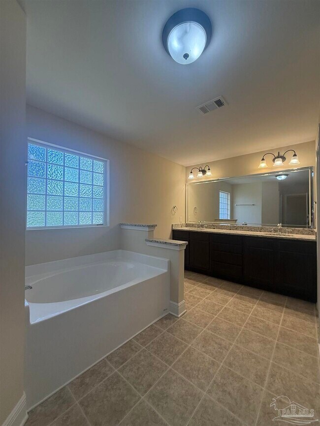Building Photo - 5973 Chi Chi Cir