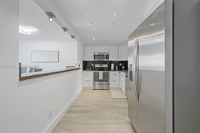 Building Photo - 19370 Collins Ave