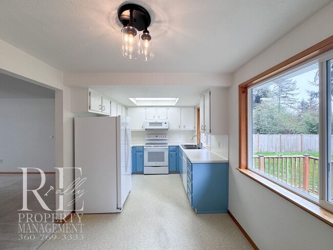 Building Photo - Bright & Spacious Single-Level Home with Dual Living Areas