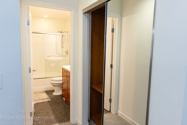 Building Photo - 2-bed, 2-bath 972sqft condo, walking distance to beach in Carlsbad Village, literally one block o...