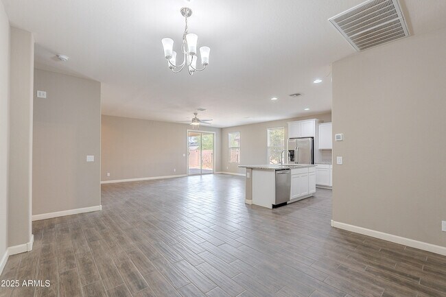 Building Photo - 13606 W Desert Moon Way