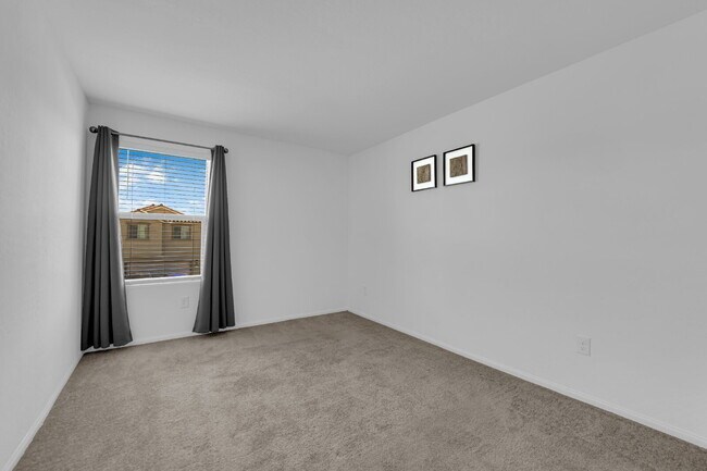 Building Photo - Don't miss out on this cozy 3-bedroom, 2-story home that's ready for you to move in!