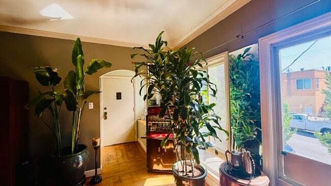 Building Photo - Whimsical 2BR/1BA, Outer Parkside Gem and Dog Friendly! FURNISHED Flexible Lease Term
