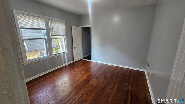 Building Photo - 142-144-144 Adams St