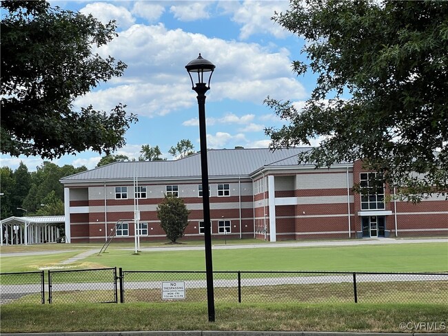 Building Photo - 3924 Village Townes Walk