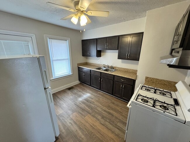 Building Photo - W. Collins Ct., 210 1/2