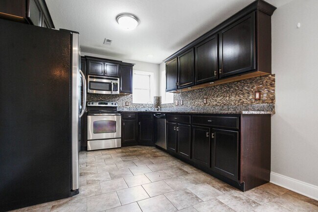 Building Photo - Pet Friendly Four Bedroom with Basement!