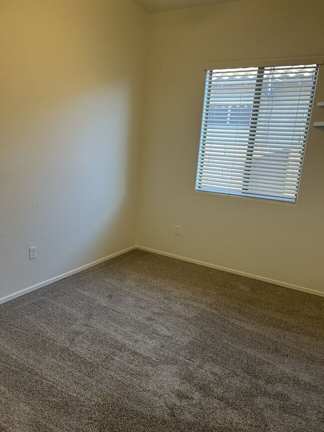 Building Photo - Unfurnished four bedroom large home!  Three car garage