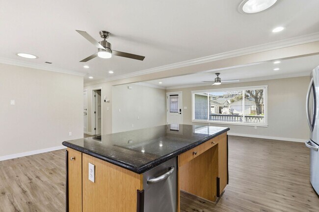 Building Photo - Turnkey Open-Concept Home with Central A/C & Solar