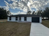 Building Photo - Brand New Designer Home Ready for Family