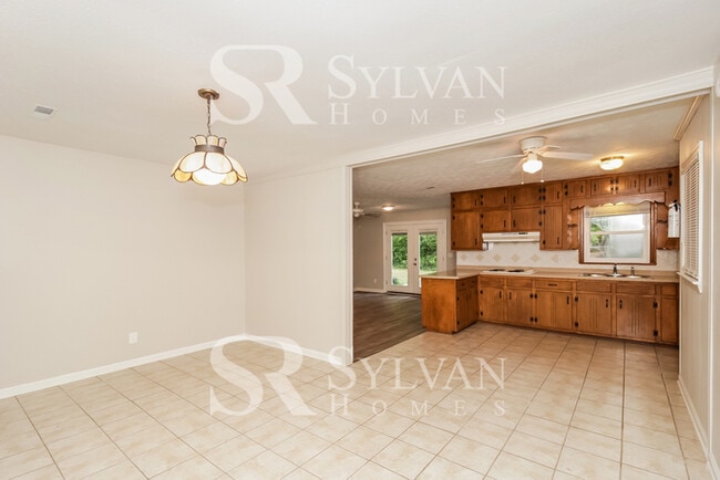 Building Photo - Turn the key. Enter. Smile. Repeat every day!