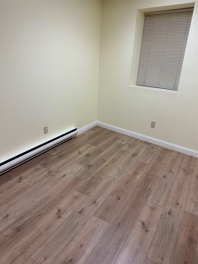 Building Photo - 5000 Hempstead Tpke