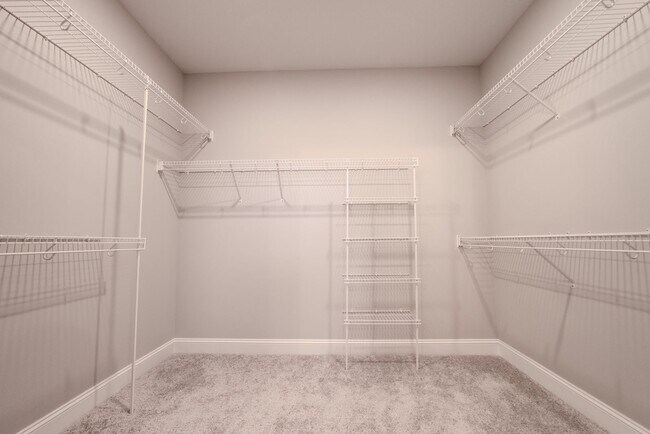 Building Photo - Elegant Home with Stone Fireplace, Kitchen Island and Designer Primary Suite