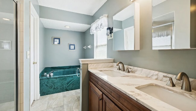 Building Photo - private - backyard fenced in large master suite!