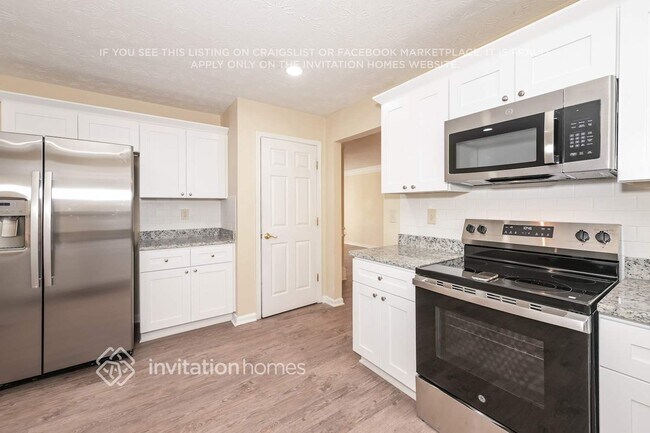 Building Photo - 6521 Carriage Ln