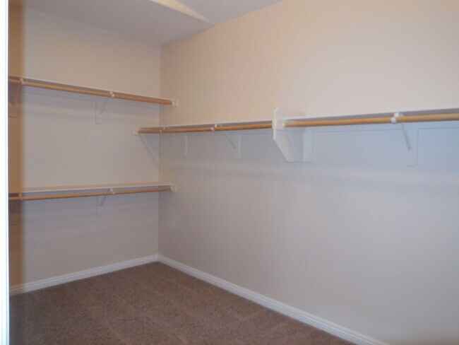 Building Photo - Spacious House w/Tons of Storage,Tile & Wo...