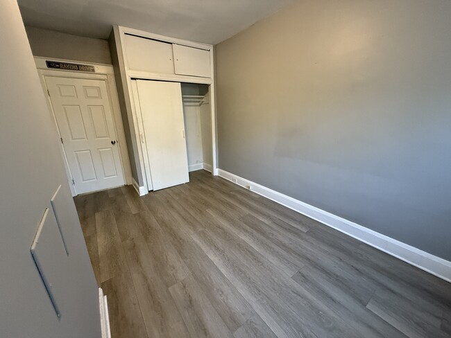 1st bedroom on main level, spacious closet - 606 N Woodington Rd