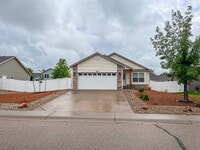 Building Photo - Spacious Wellington Home with Fenced Yard & Two-Car Garage