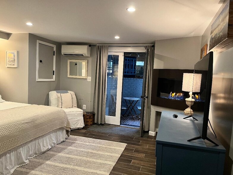 Large bedroom with Fireplace & Patio - 917 Constitution Ave NE