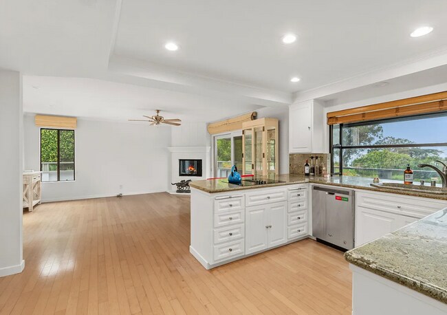 Building Photo - Unfurnished Village of Del Mar Home Boasti...