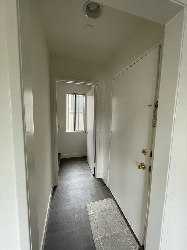 inside of front door leading to stairs - 10330 Riverside Dr