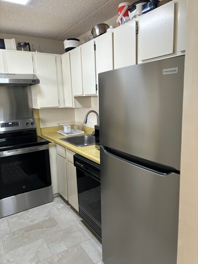 Building Photo - Available May 1, 2026 | Furnished 1 Bedroom, 1 bathroom and 1 assigned parking