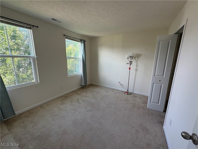 Building Photo - 3366 Wind Song Ln