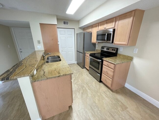 Building Photo - ANNUAL RENTAL - OASIS- 2 BED/2BATH