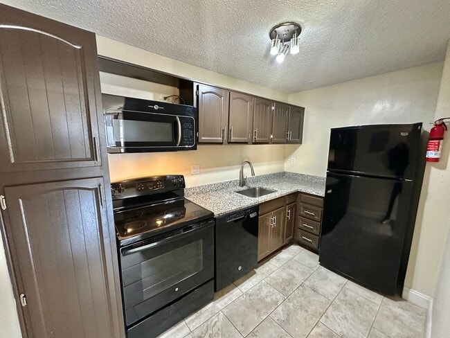 Building Photo - Dupont's Pulchritudinous Palladium 1 bedroom Condo w/ Balcony & Pool. All utilities included.