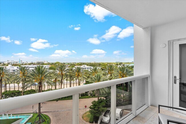 Building Photo - 10275 Collins Ave