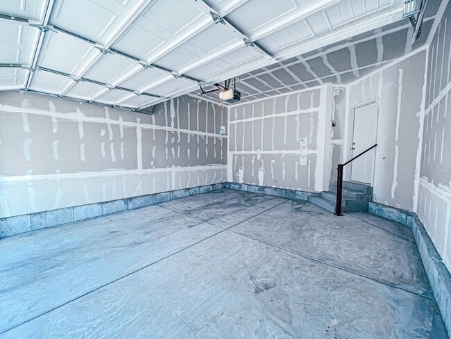 Building Photo - Brand New Idyllic Townhome in AF