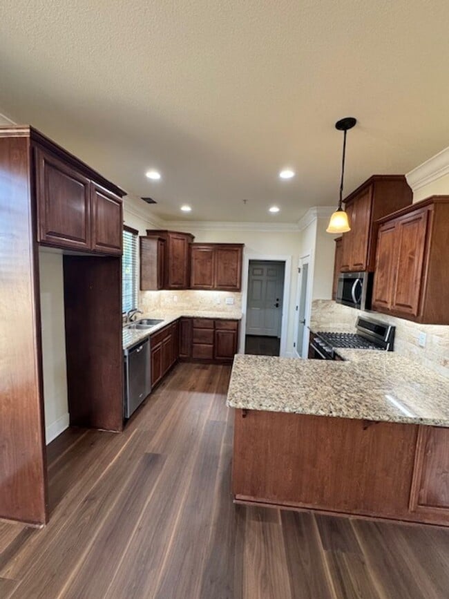 Building Photo - $500 Move in Special with signed lease by 12/15/2025 ~ Upscale Modern 4 Bed | 2.5 Bath – Yard Mai...