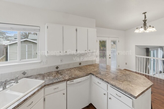 Building Photo - 3628 E 23rd Ave