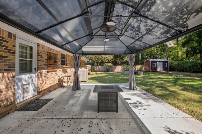 Building Photo - Pace 3BR Home with Bonus Room, Patio Gazeb...