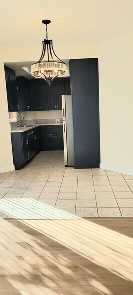Dining area by kitchen - 5135 Zelzah Ave