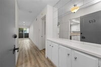 Building Photo - "Charming 1-Bedroom Furnished Retreat with...