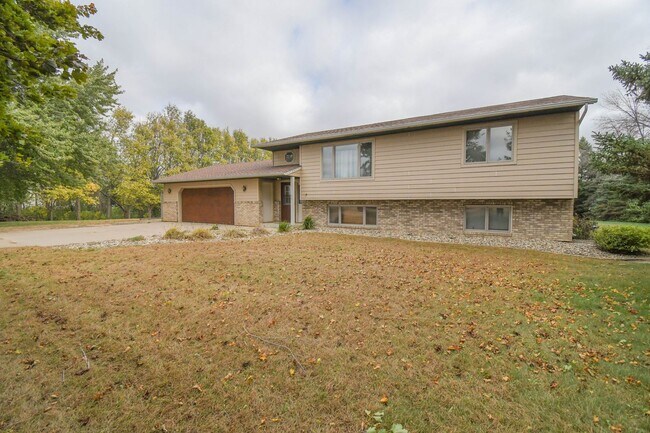 Building Photo - Spacious 4-Bedroom Acreage with Stunning Views Near Hartford — 1.5 Acres of Country Living!