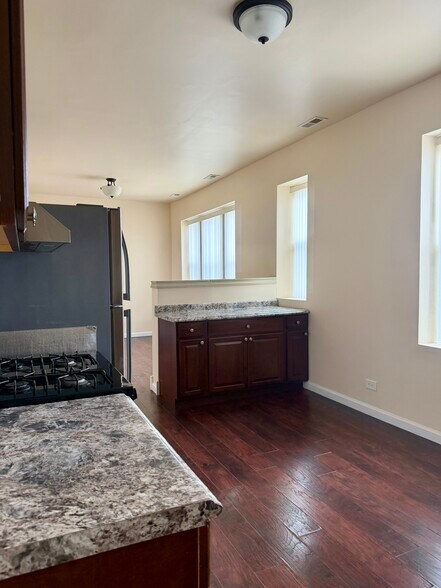 Kitchen and Family room - 12705 Honore St