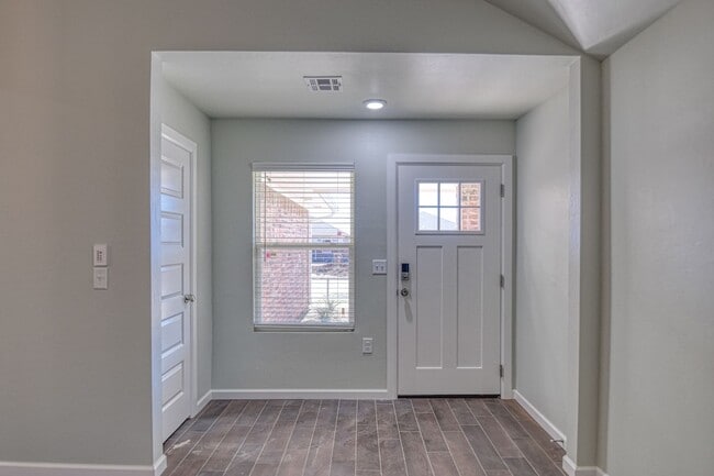 Building Photo - New Construction in Varenna Landing! Storm shelter and lawn care included!