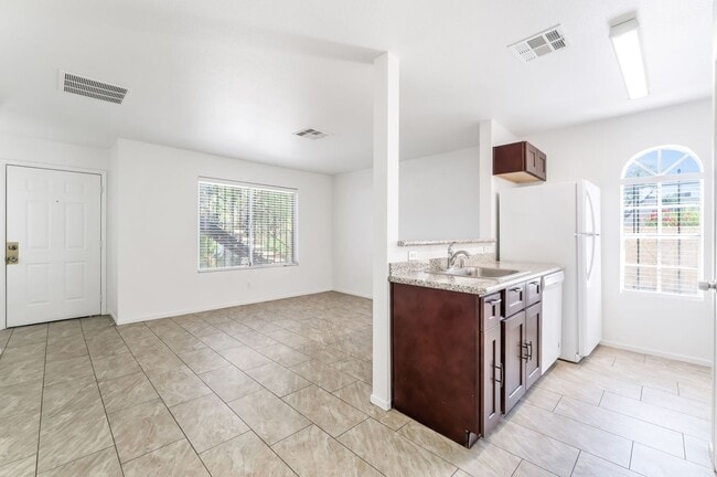 Building Photo - Modern Gated Condo Near the Strip with Pool & Covered Parking!