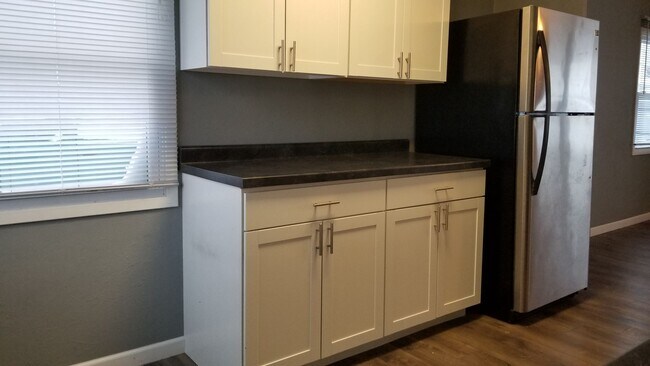 Building Photo - NE 3 bedroom updated with appliances and garage