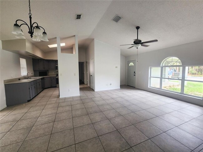 Building Photo - 9392 N Sandree Dr